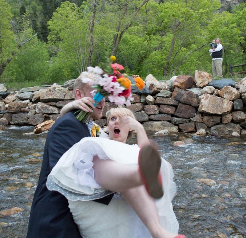 My husband tried to pick me up while standing dangerously close to the creek after our wedding