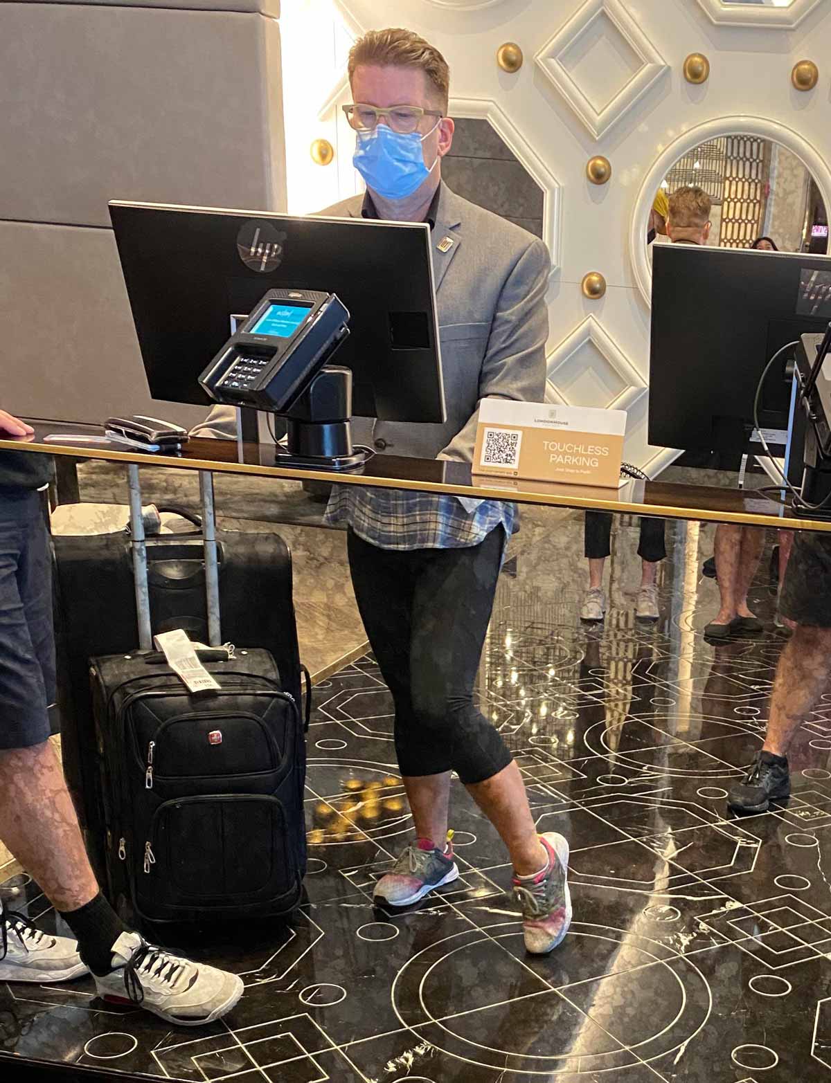 The reflection in the mirror on this hotel check-in desk