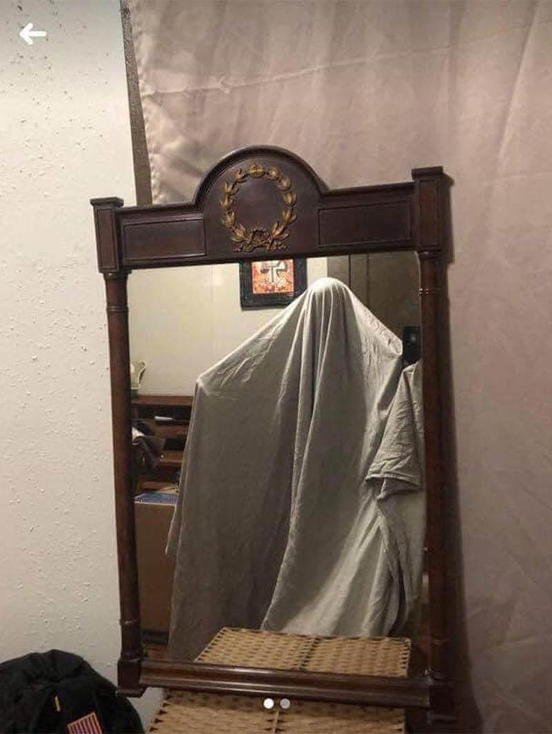 Mirror $25. Totally not haunted
