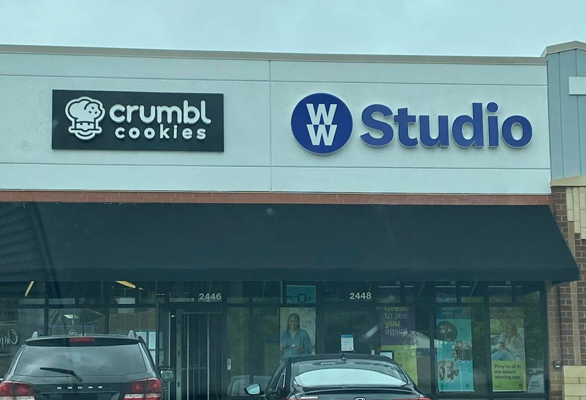 A cookie shop next to a Weight Watchers