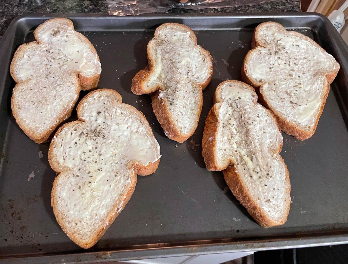 Bread got squished on the way home from the store. Now we are having Garlic Ghosts