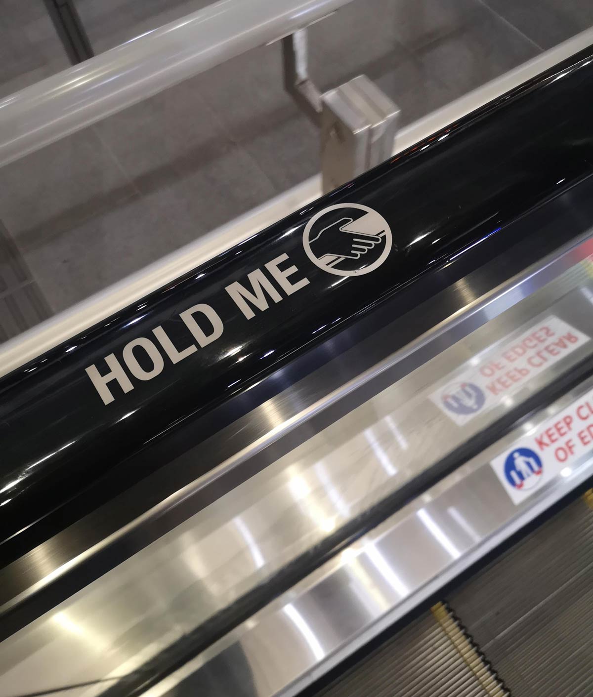 The escalator handrails in London are getting as needy as me