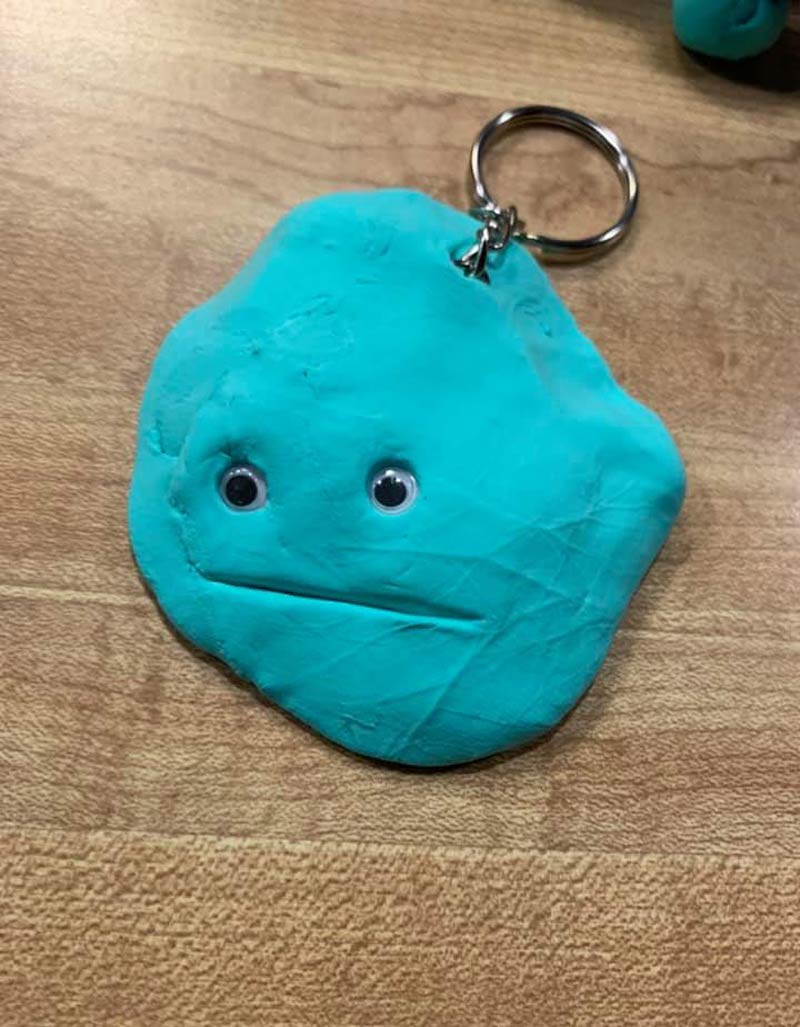 My friend's little kid made her this Pizza keychain