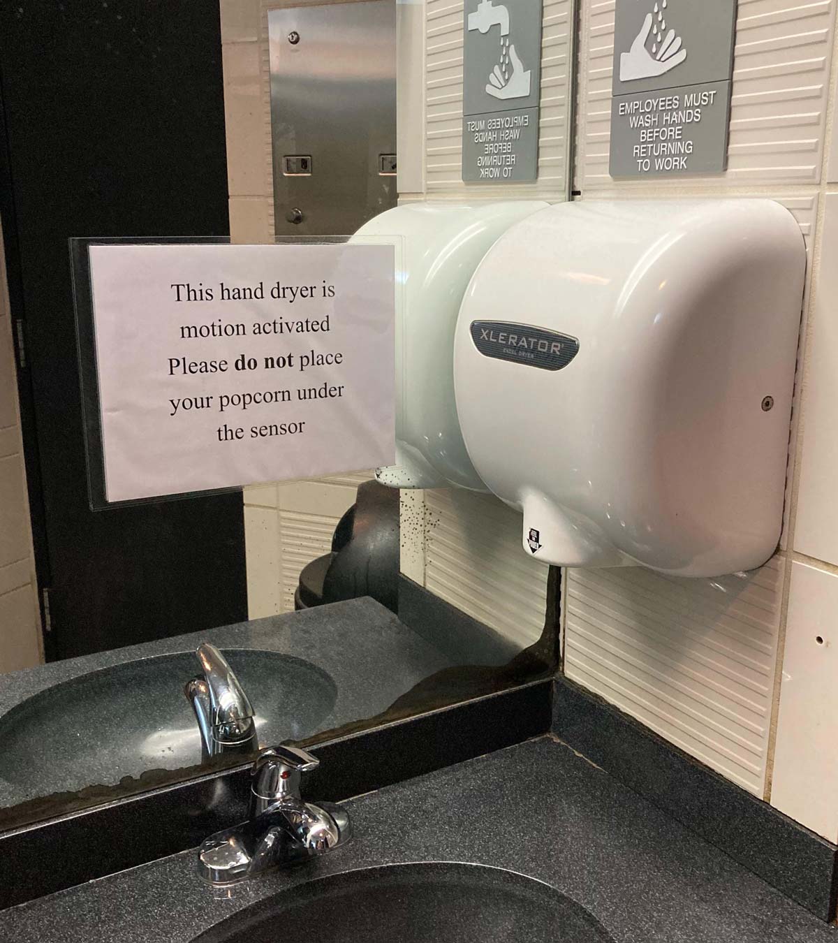 Saw this sign in a movie theatre restroom
