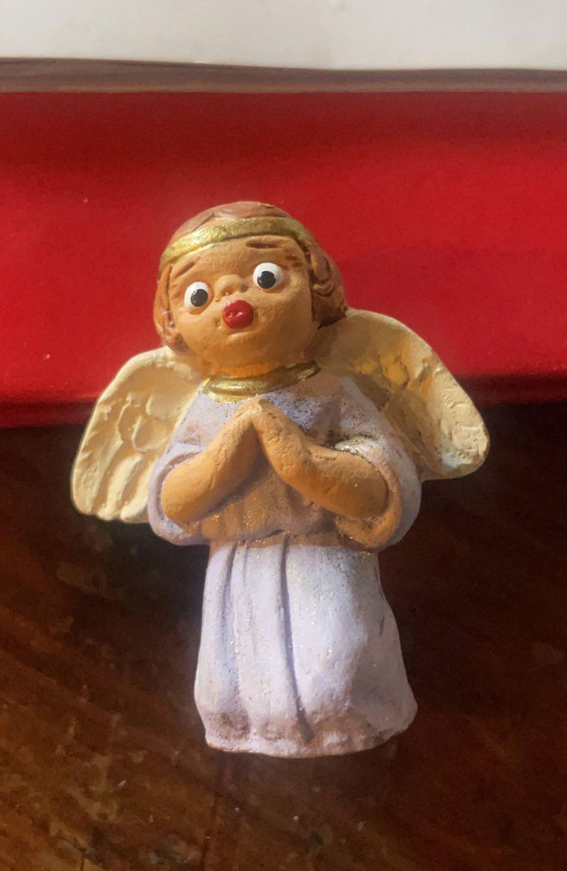 My parents have a very concerned, very surprised angel ornament