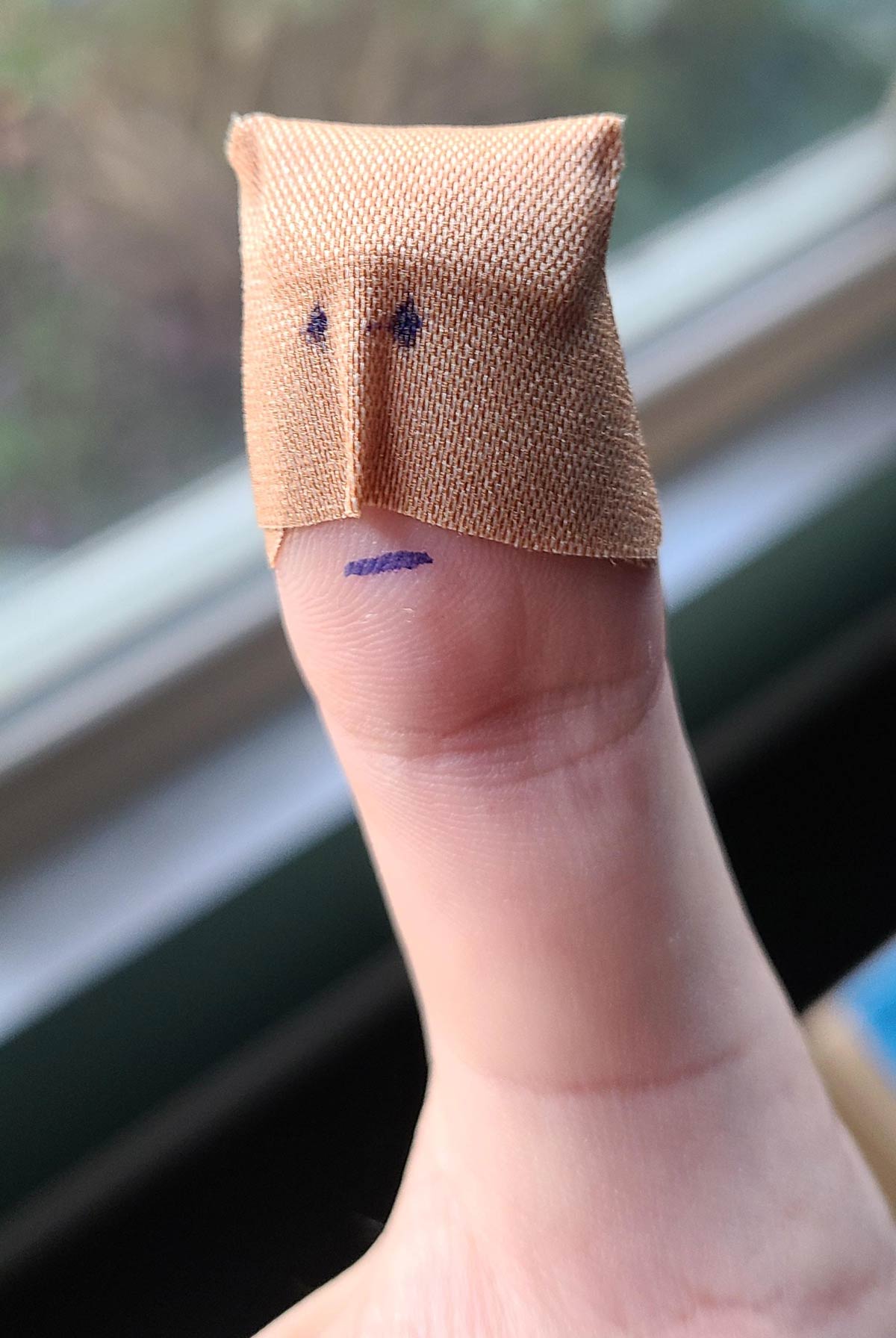 Sliced my finger open. Realized after putting on the bandaid that it looked like a lame superhero