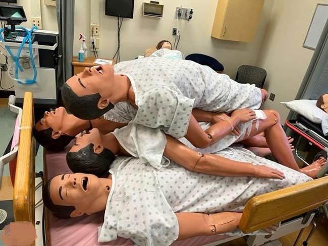 Someone thought that this would be the perfect picture to use to auction off some first aid Mannequins