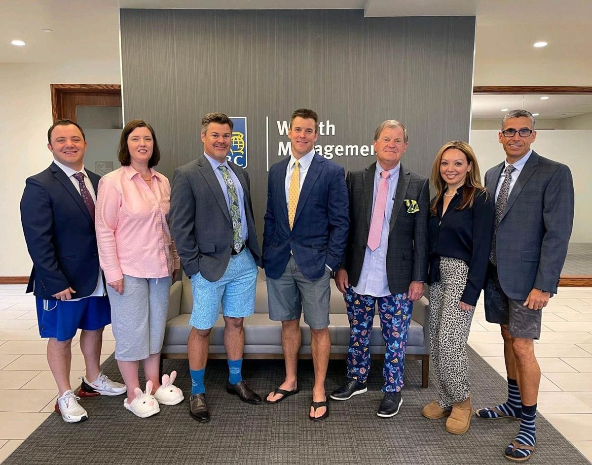 A group of managers at RBC decided to take a picture in the outfits they use for zoom meetings