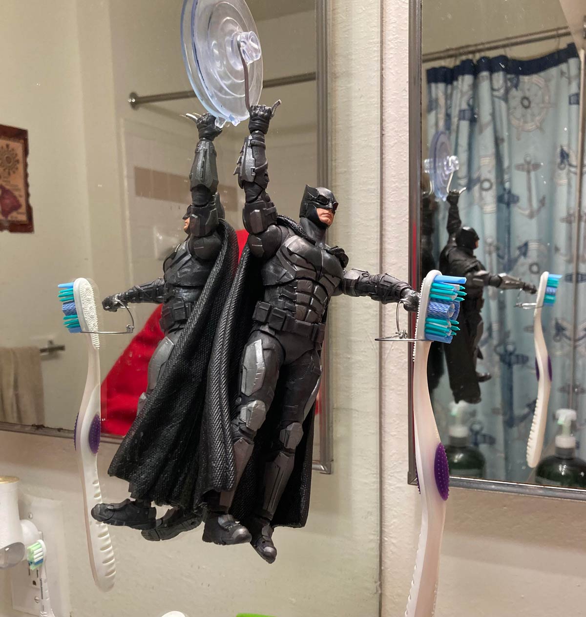 I made my roommate a Batman toothbrush holder