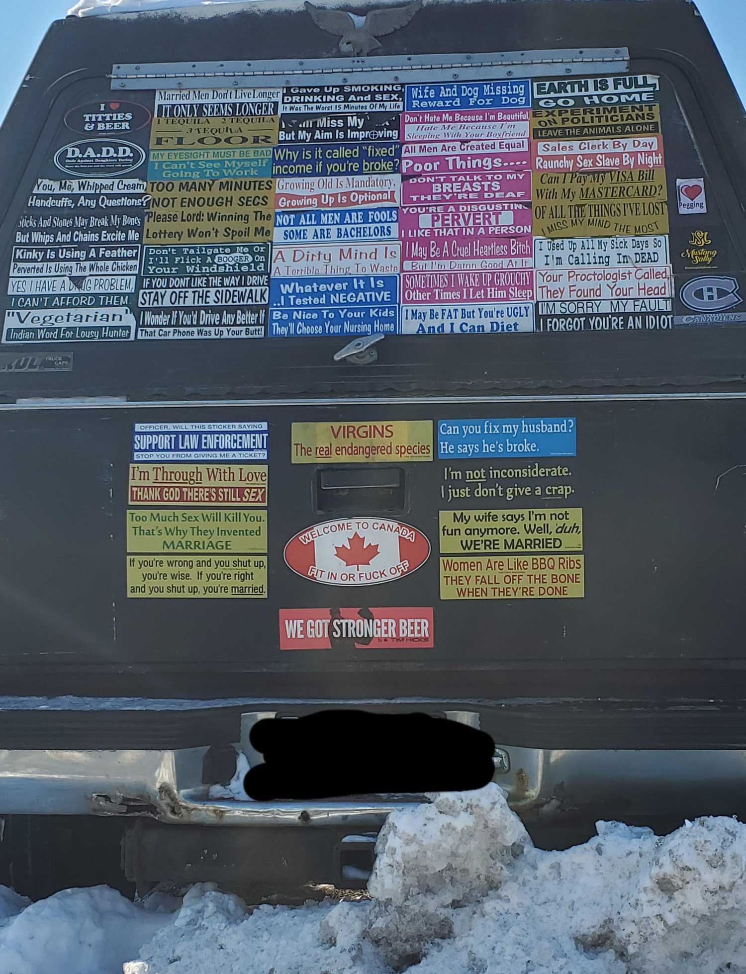 Walked by this truck full of interesting bumper stickers today. There were more on the sides