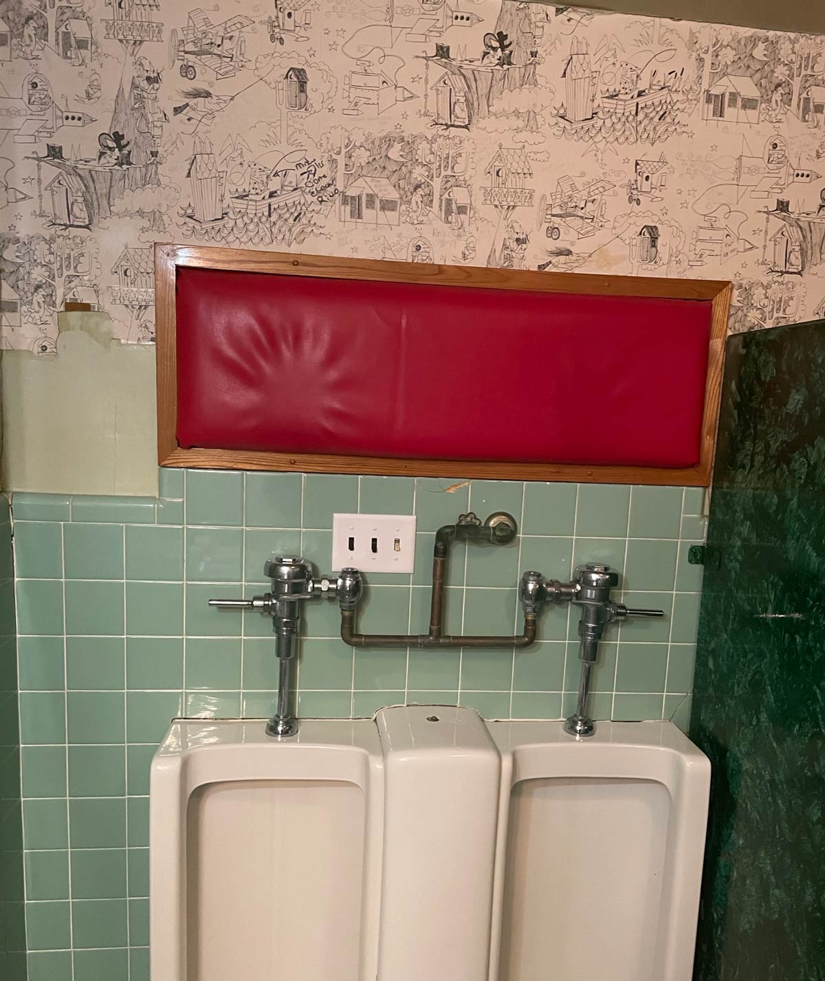 I’m at a townie bar in rural Wisconsin, they have a headrest at the urinals in the men’s room