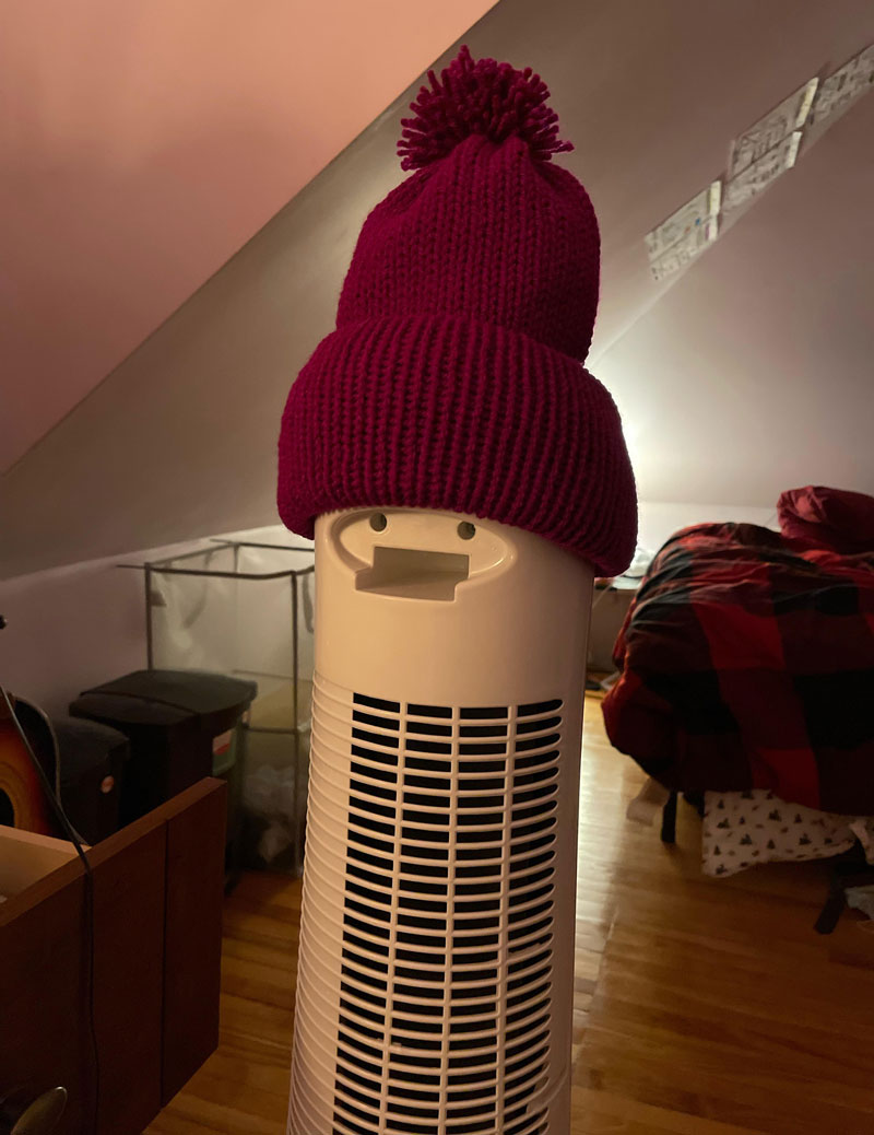 I put my hat on my fan to block the light up display and discovered this on the other side