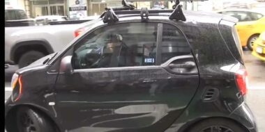 Shaq gets in his Smart Car