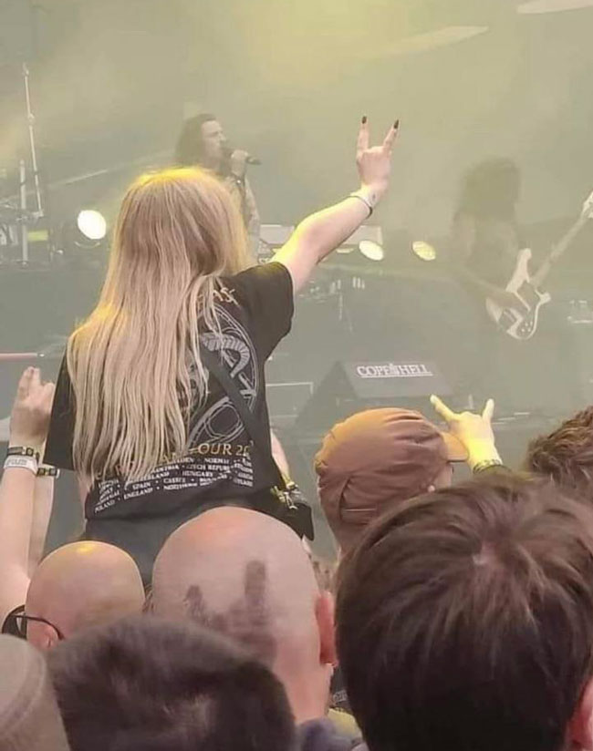 2 guys make a complete ass out of themselves at rock concert