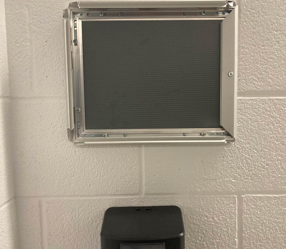 Student stole the “Students caught stealing will be suspended” sign from the bathroom