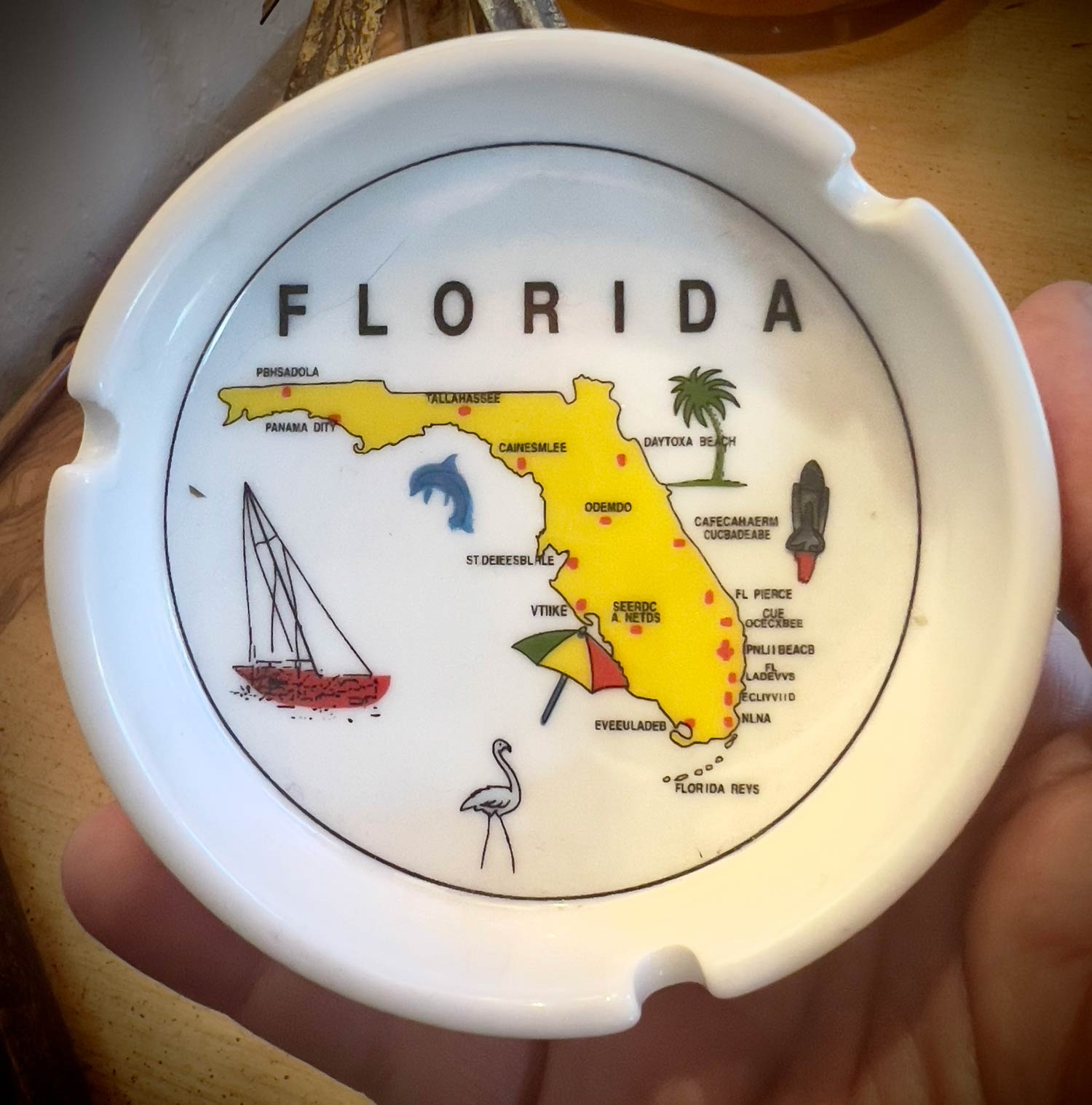 A treasured family heirloom, our Florida souvenir ashtray, ca. 1983. (Look closely)