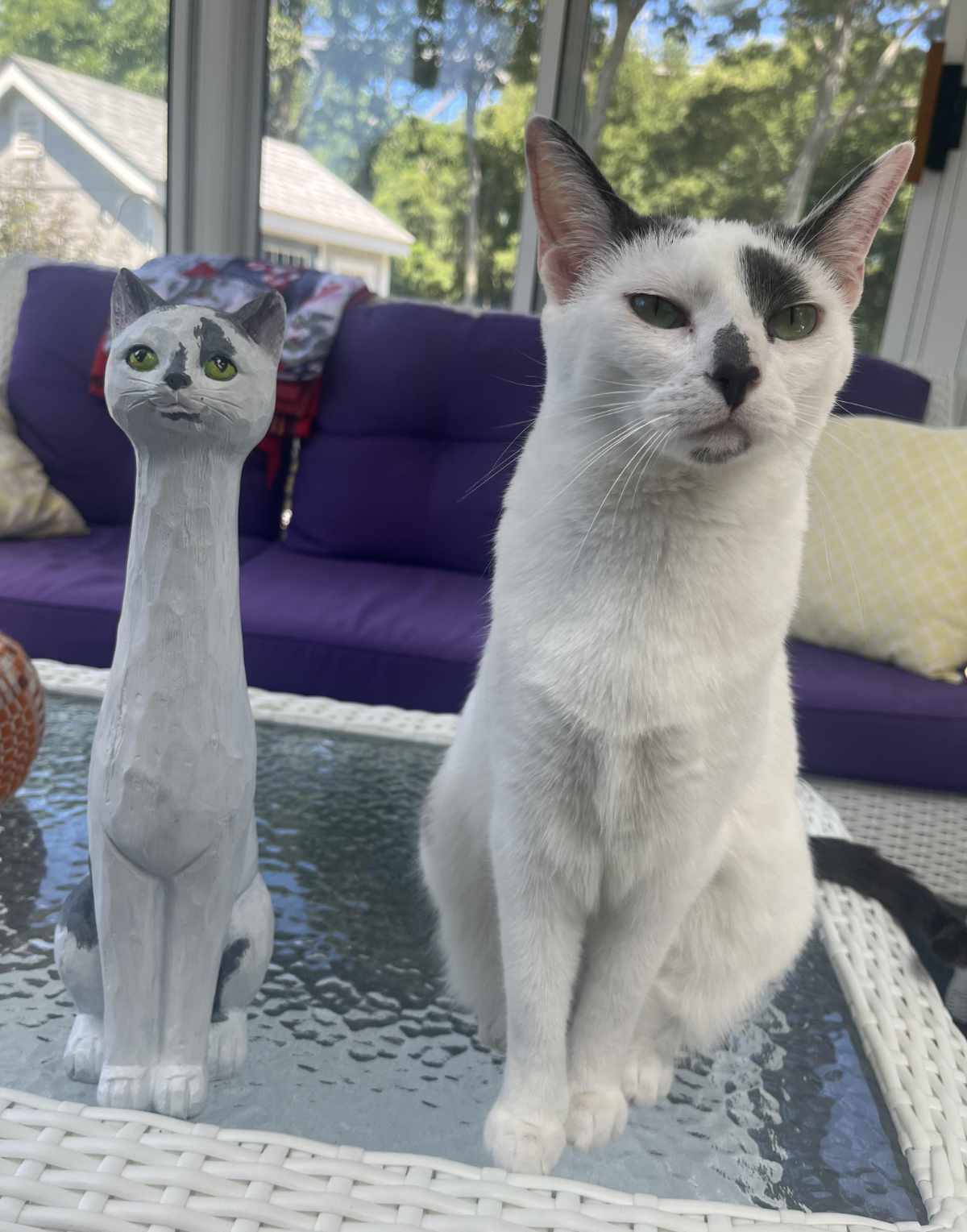 A cat statue painted to match my cat