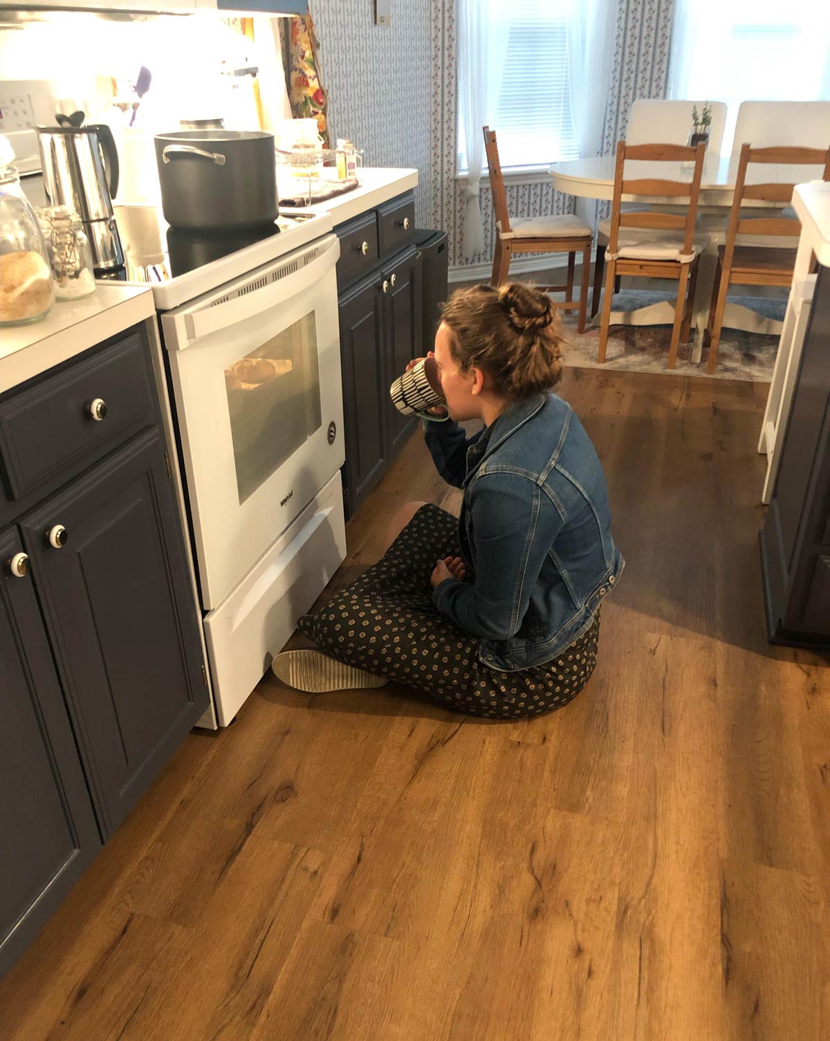 My sister watching her homemade bagels cook