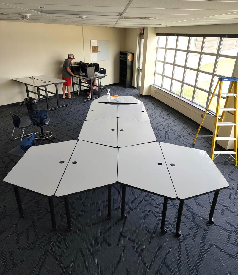 My wife asked our teenager to help set up tables in her classroom. Instant regrets