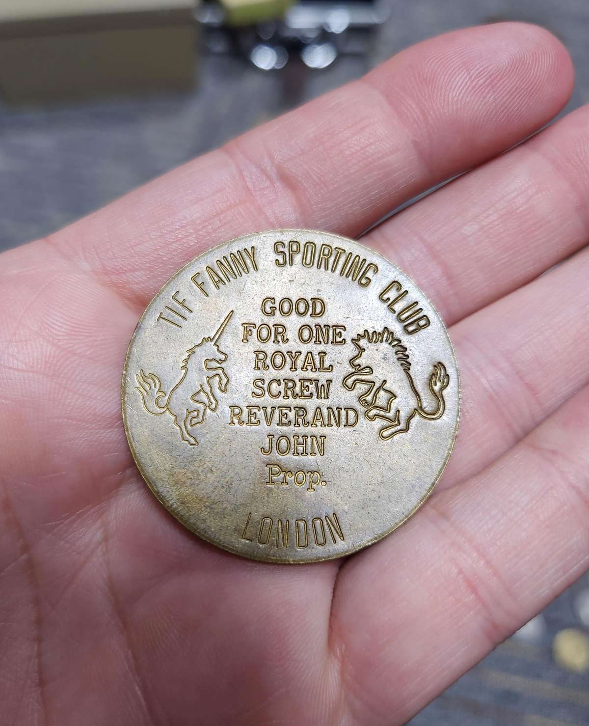 This 1920's brothel token good for "One Royal Screw"