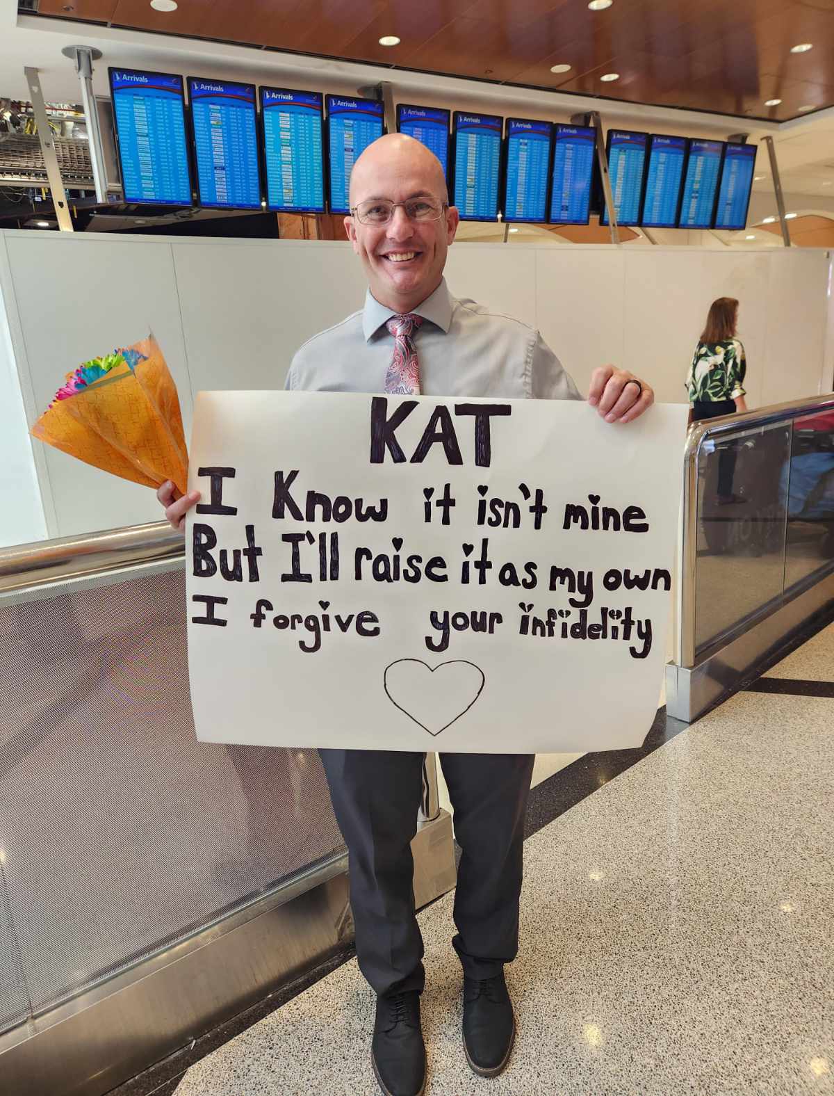 I flew my bestie in for her birthday and talked my husband into holding up this sign