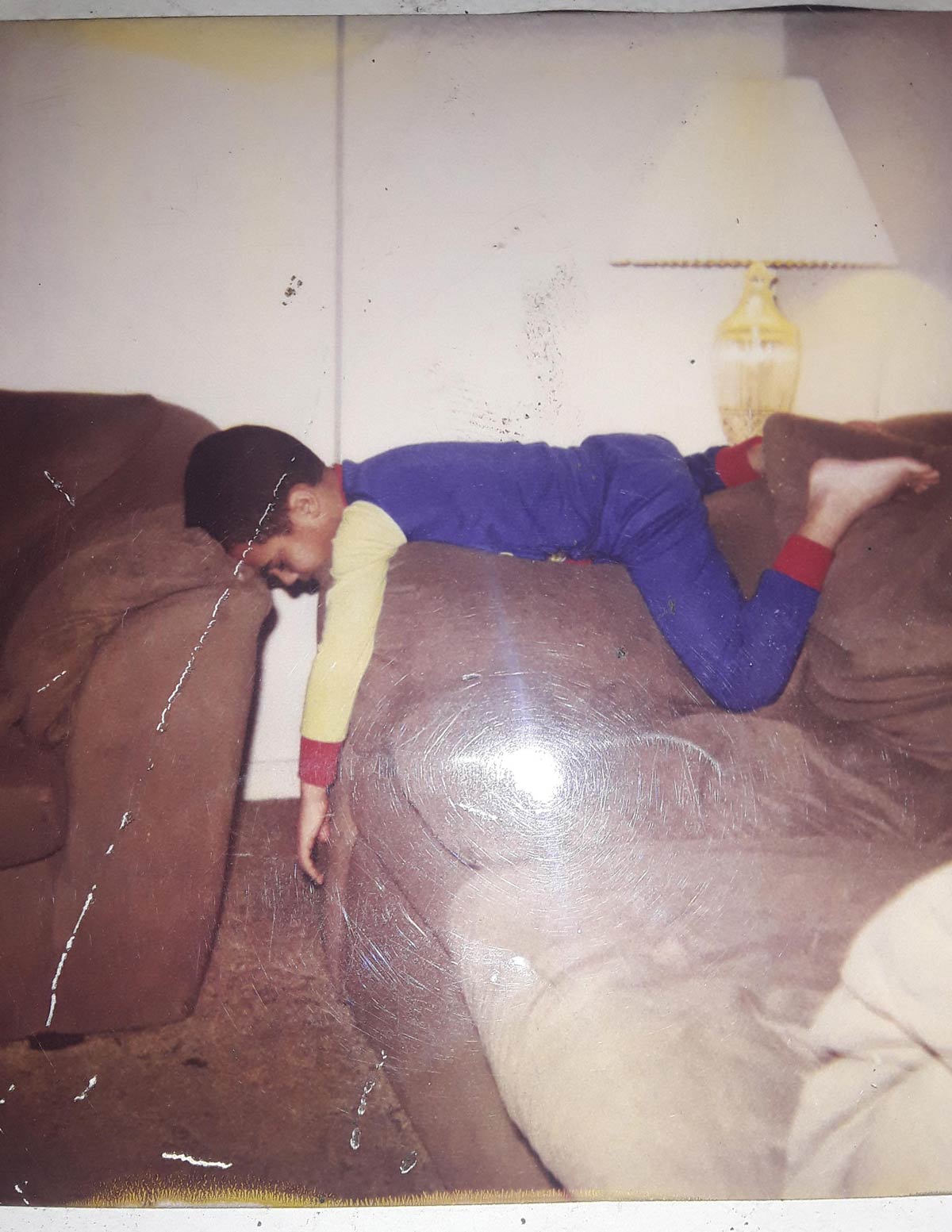 Saw the posts about people falling asleep in some crazy positions as a kid. Here's mine