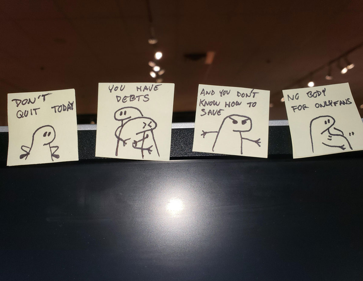 My coworker's motivational strip on his computer