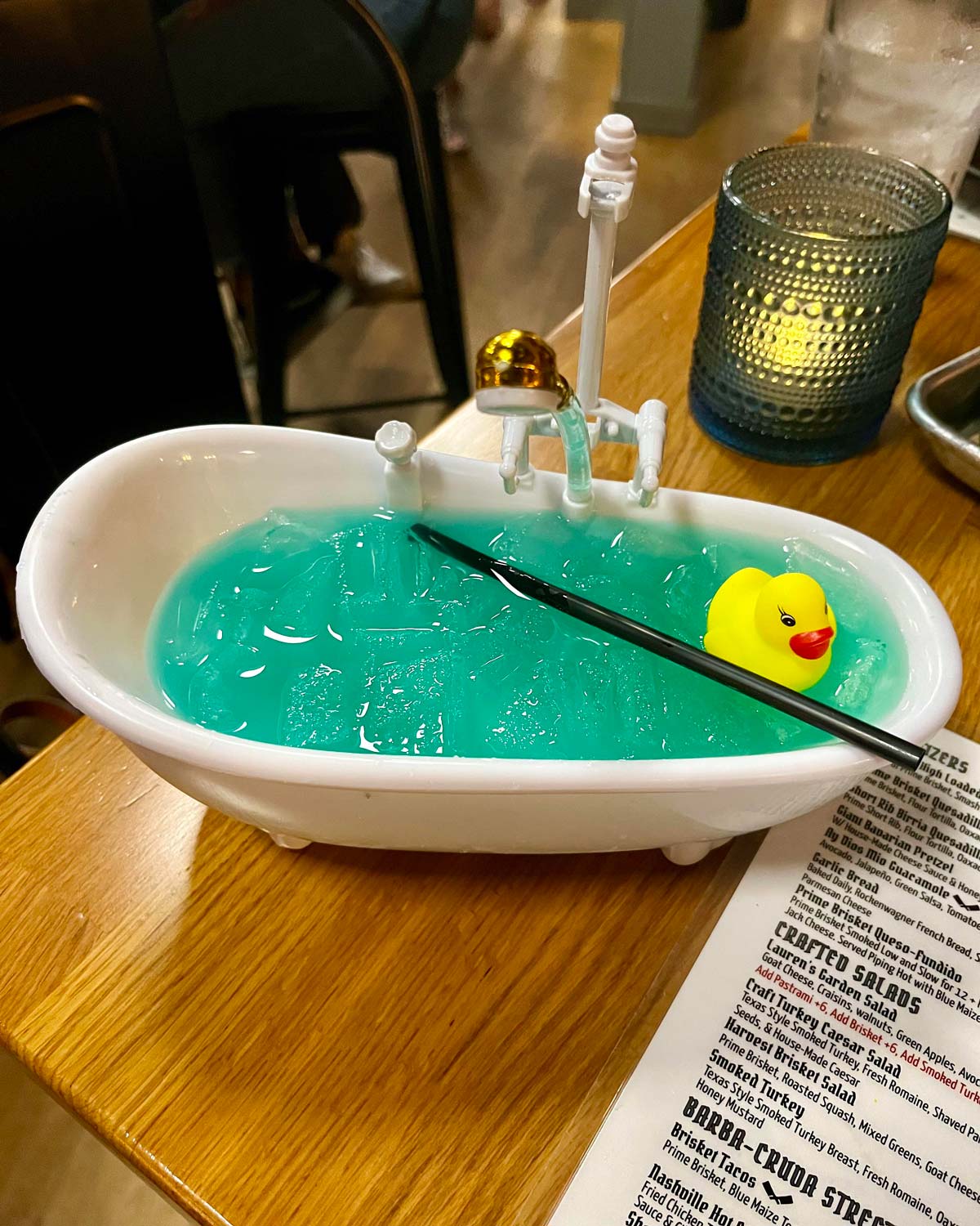 My cocktail came in a bathtub. It’s called Duck around and find out