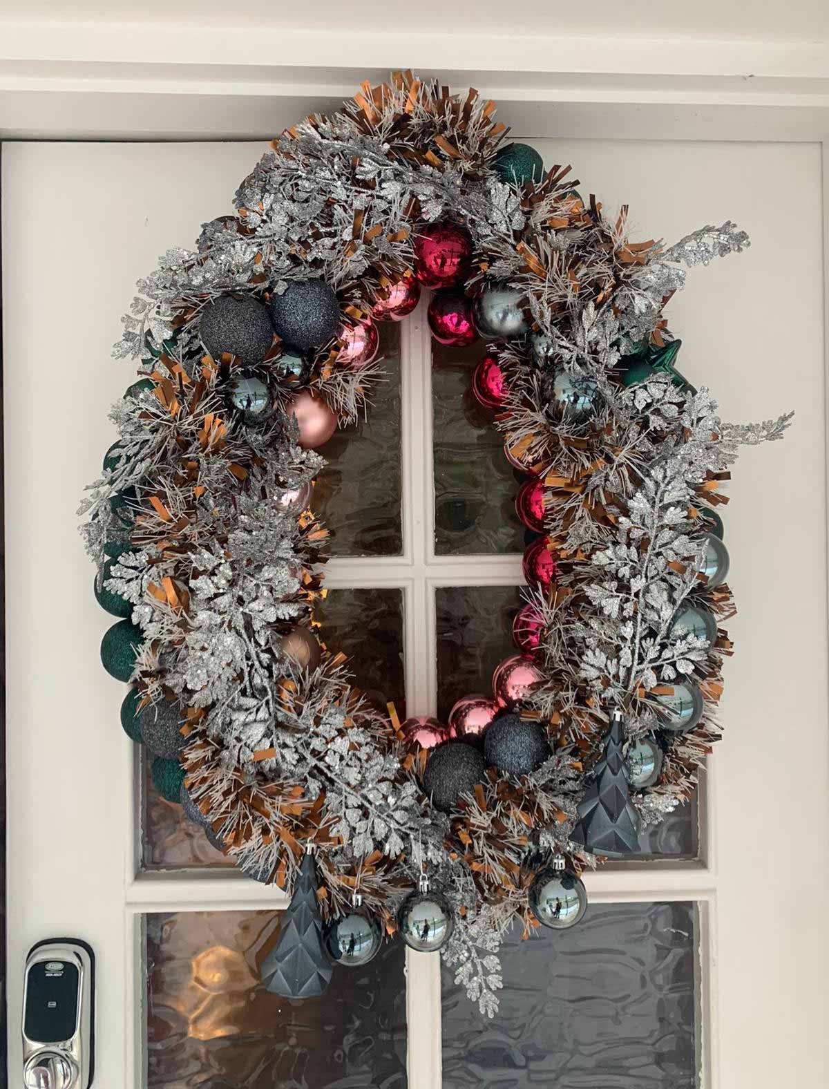 My wife's attempt at a Christmas wreath - I named it our festive door vag