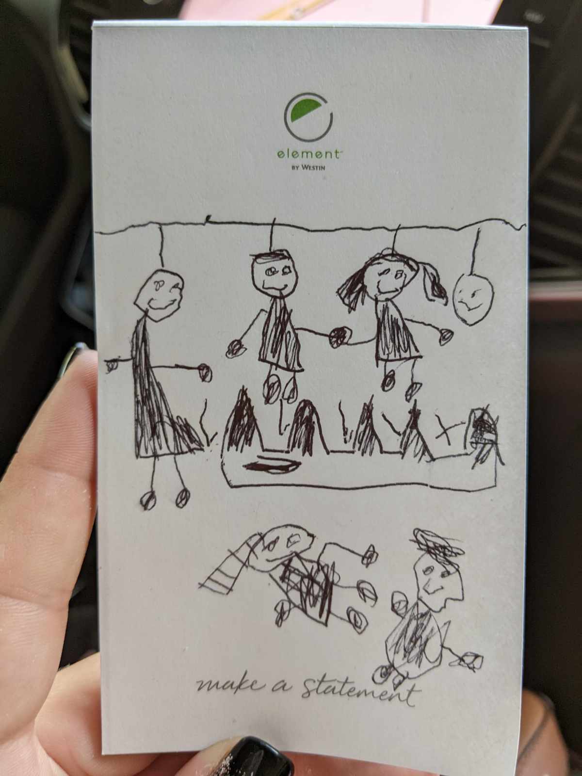 My niece drawing the family's zip lining adventures today