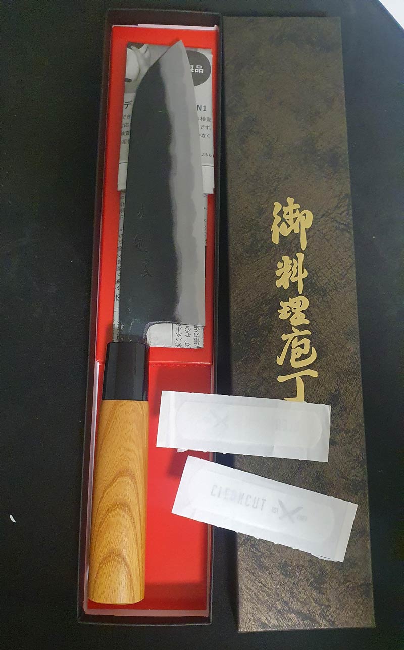 I ordered a carbon steel Japanese Chef's Knife and it came with 2 band aids