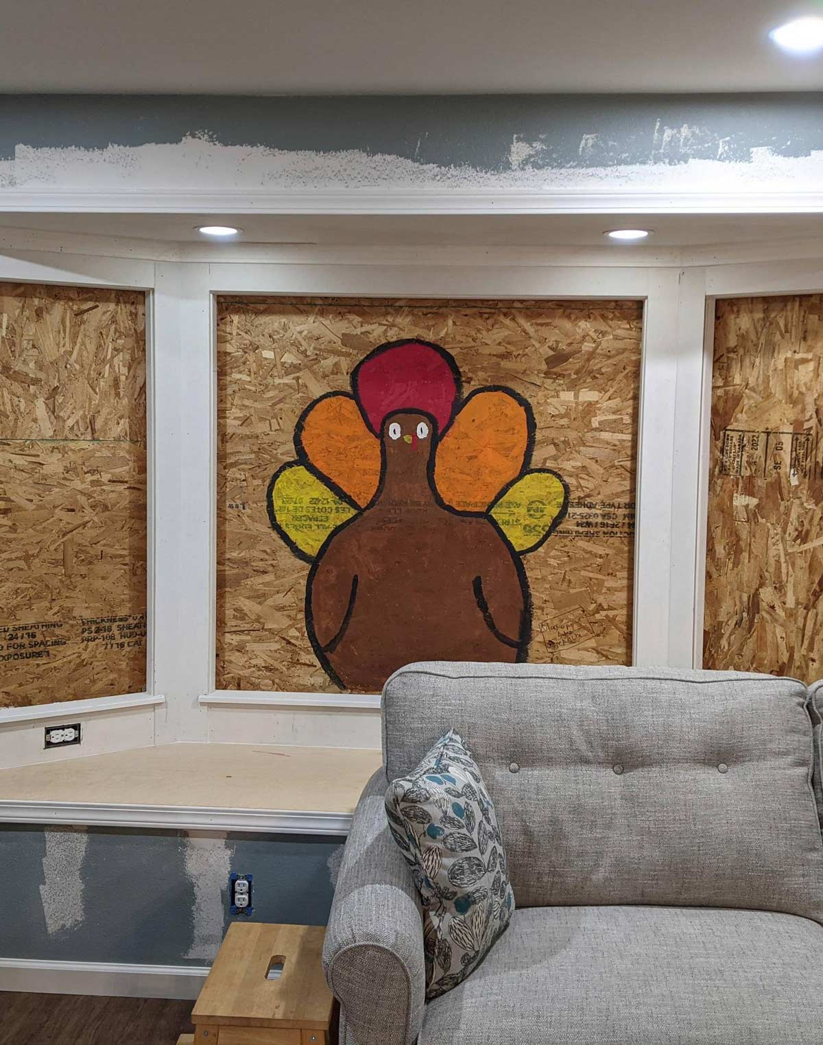 Our remodel project didn't get completed in time for Thanksgiving, so my daughter painted a turkey on the plywood