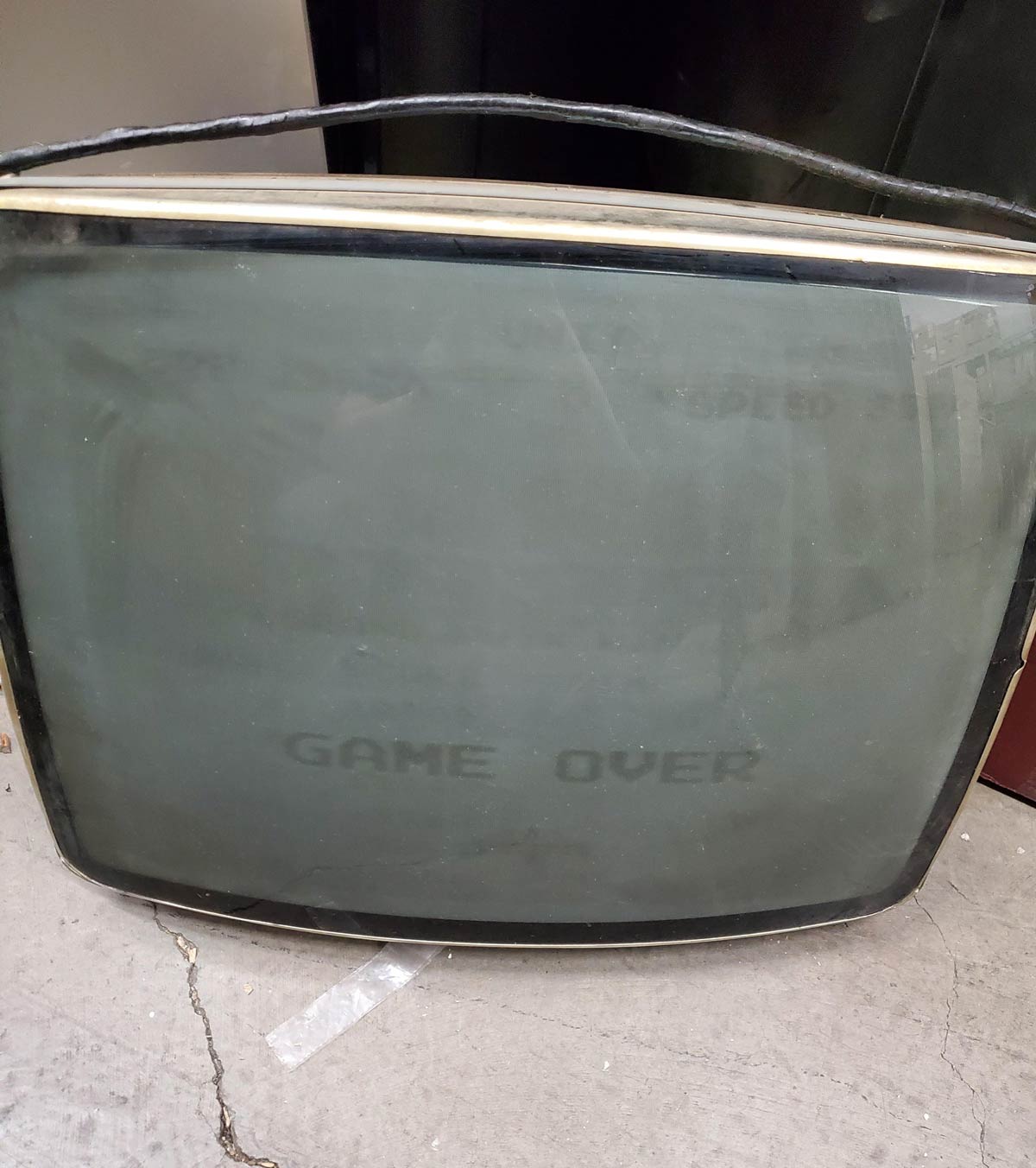 A broken tube TV in my work has GAME OVER burnt into the screen