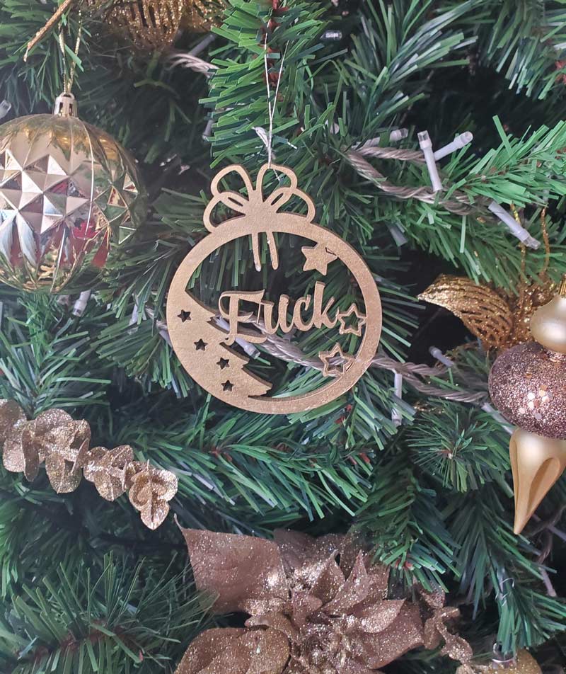 My MIL had wooden laser cut ornaments made for each of her children and grandchildren this year. The ornament for Erick didn't turn out as planned