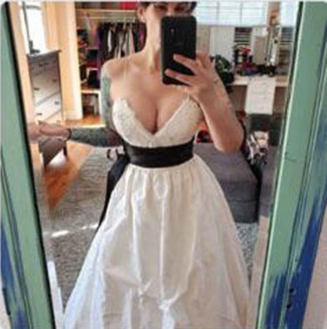 “Never worn before” wedding dress!