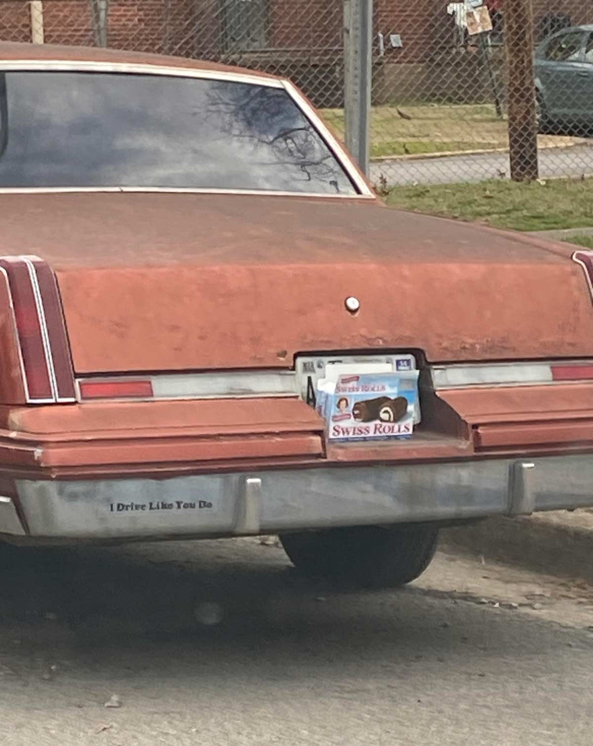 Found this car in downtown Nashville today that had expired tags. And the owner decided to hide it by placing an empty box of Little Debbie Swiss Rolls in front of it