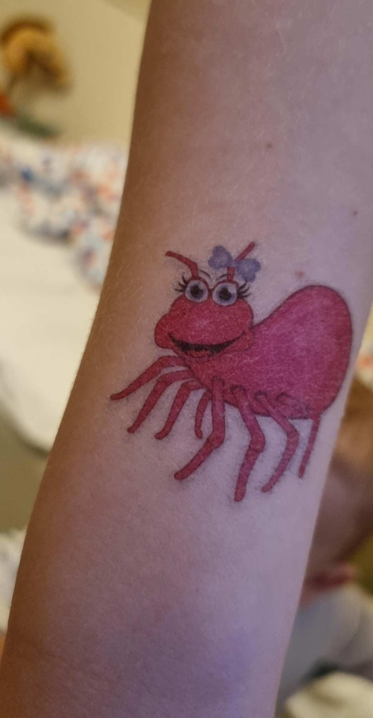 Out of hundreds of fake tattoos my daughter could have chosen after the dentist visit, she chose a tick