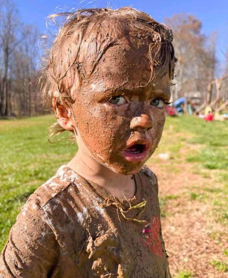 My 2-year-old nephew and fell into some "mud" while petting the pigs, I don’t think he was happy