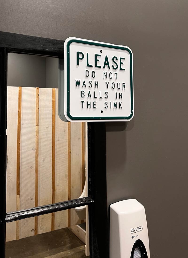Wild bathroom sign