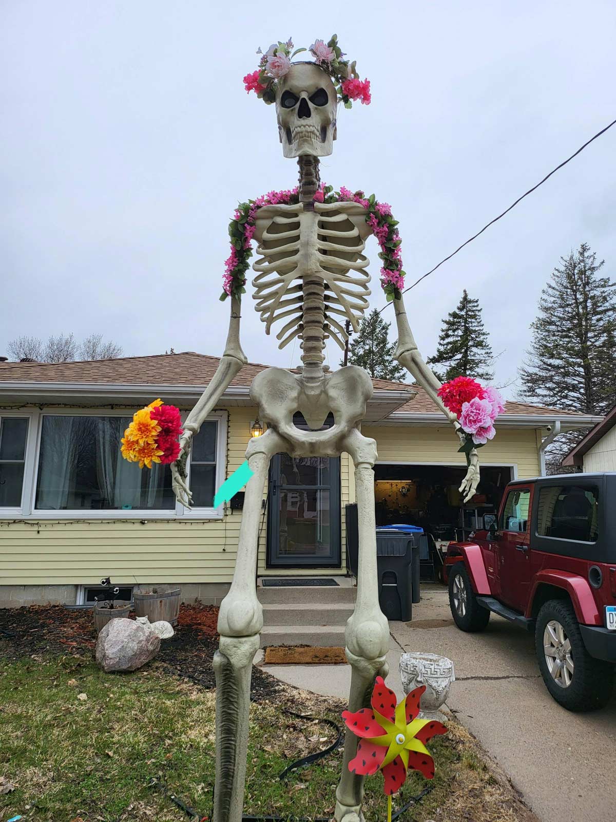 Geoff my 12ft skeleton is decorated for spring!