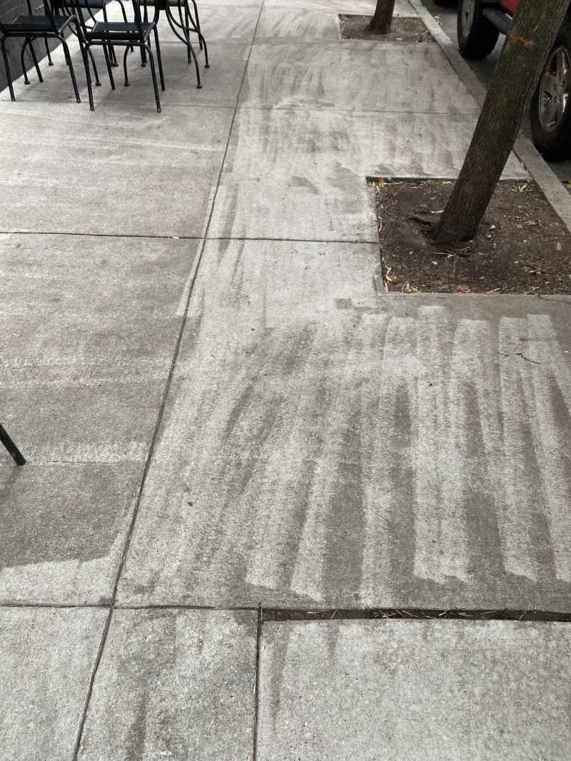 Power washed the sidewalk, boss