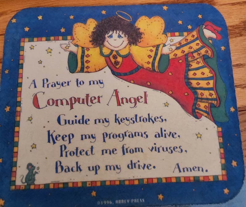 My religious grandma's mousepad from her computer room