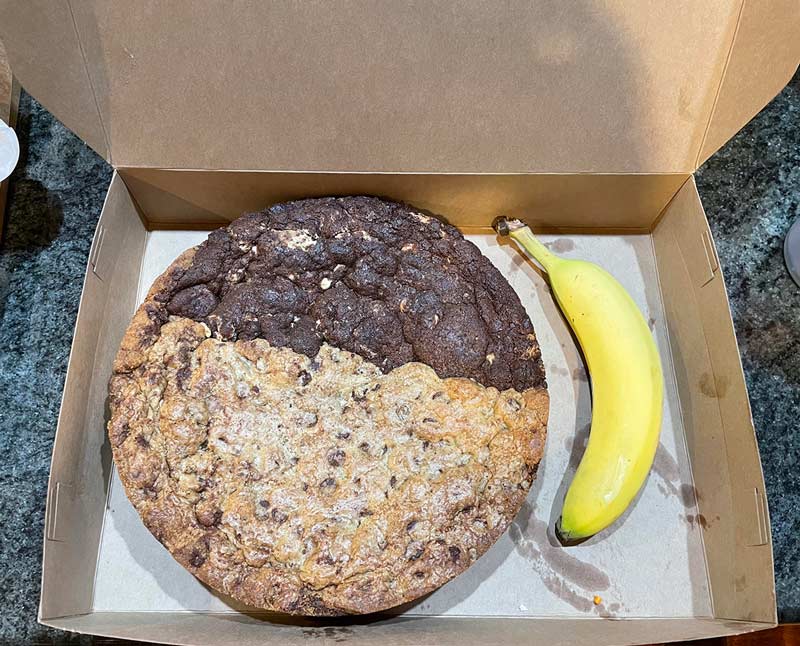 I work at a bakery and they said I could only bring one cookie home (banana for scale)