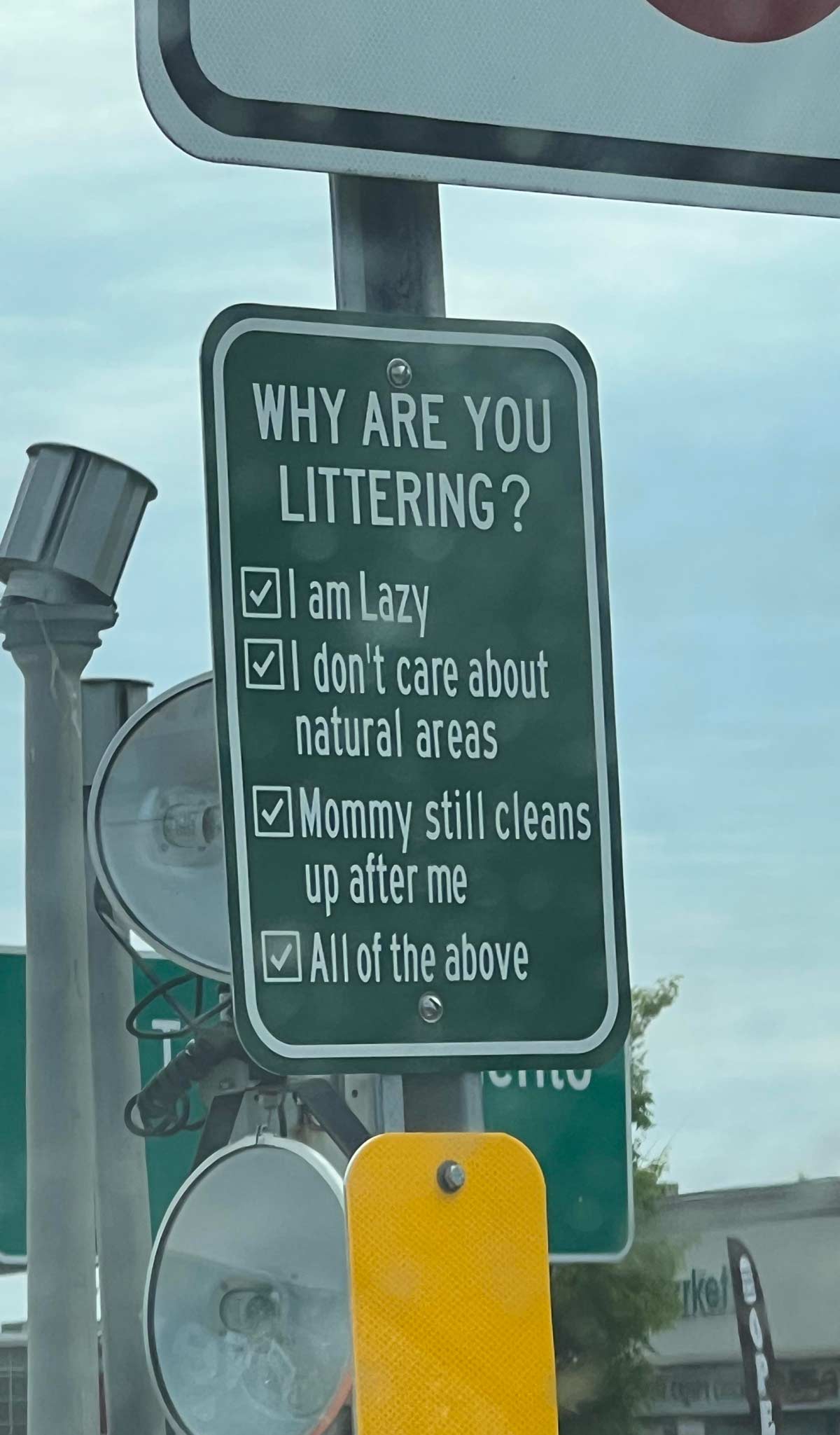Saw this littering sign while waiting at an intersection