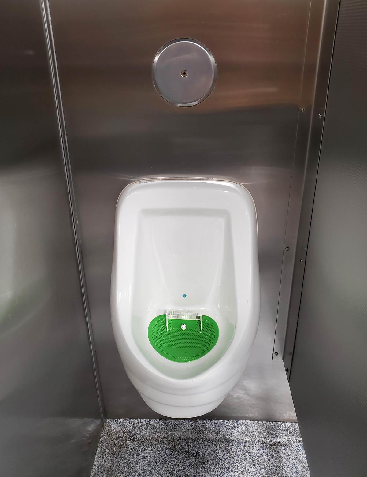 This urinal has a soccer game