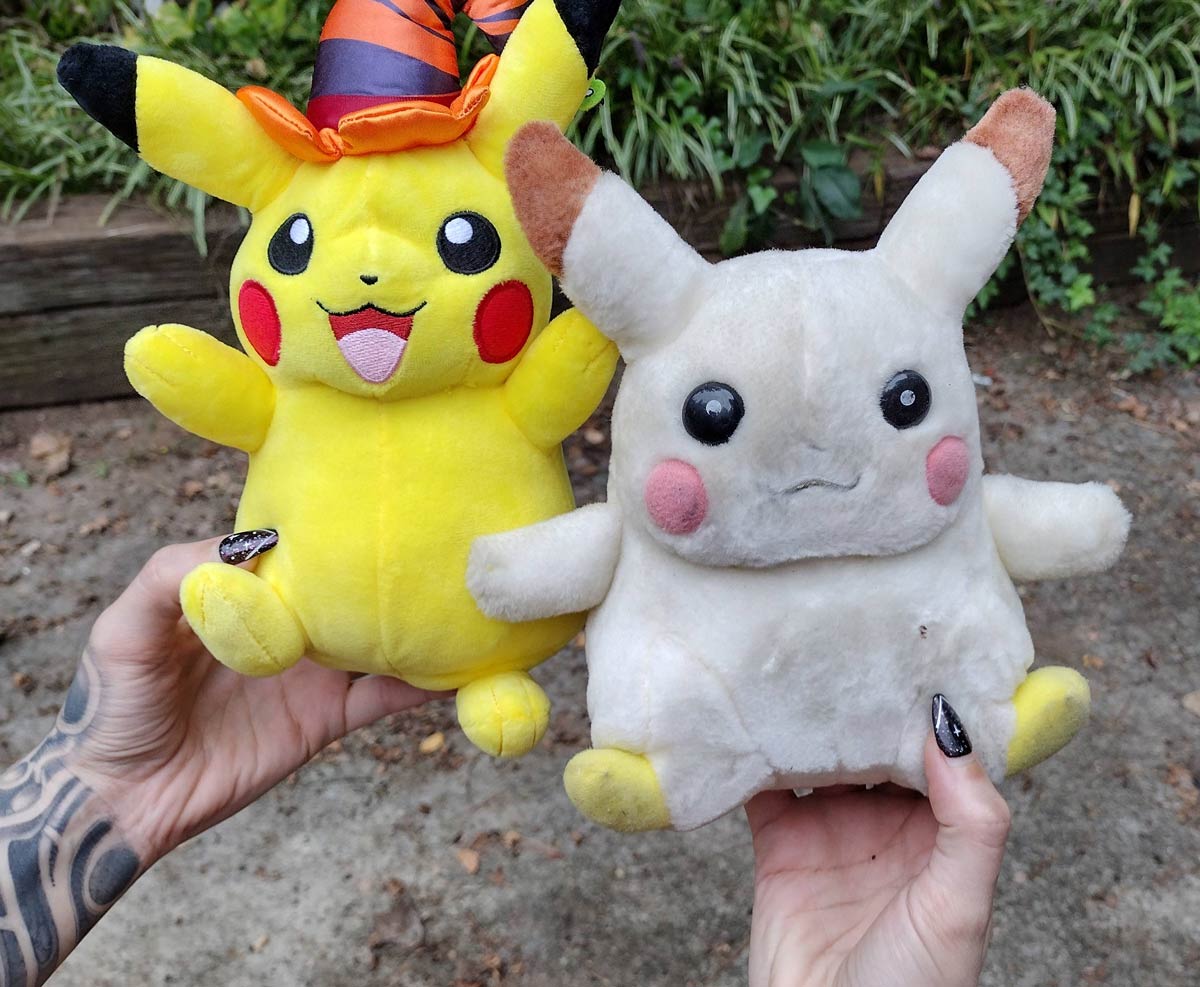 Brand new Pikachu replacing its 15 year old, sun bleached cousin