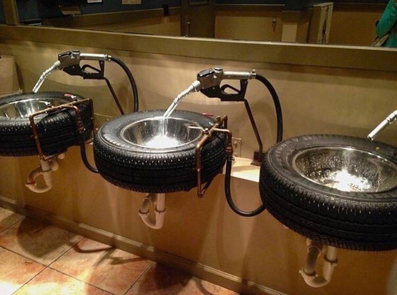The sinks at a car themed restaurant