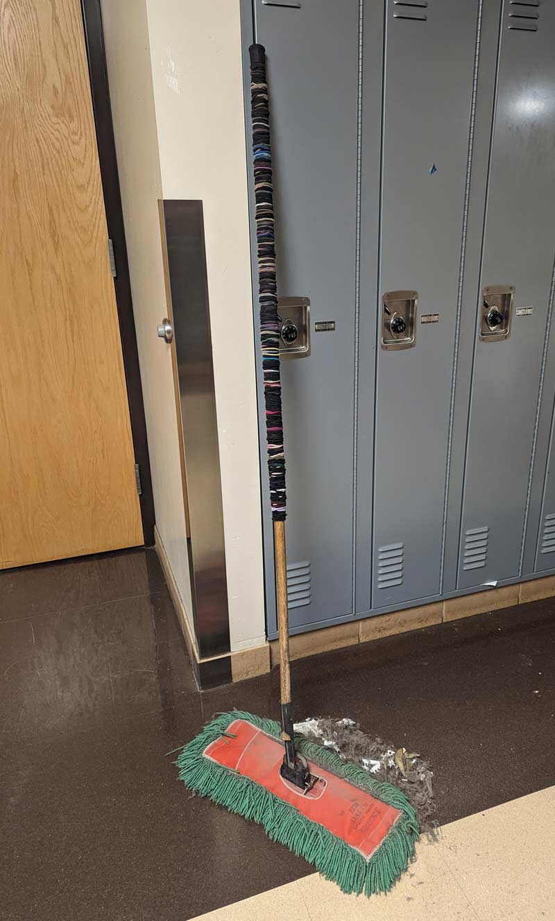 A high school janitor's broom