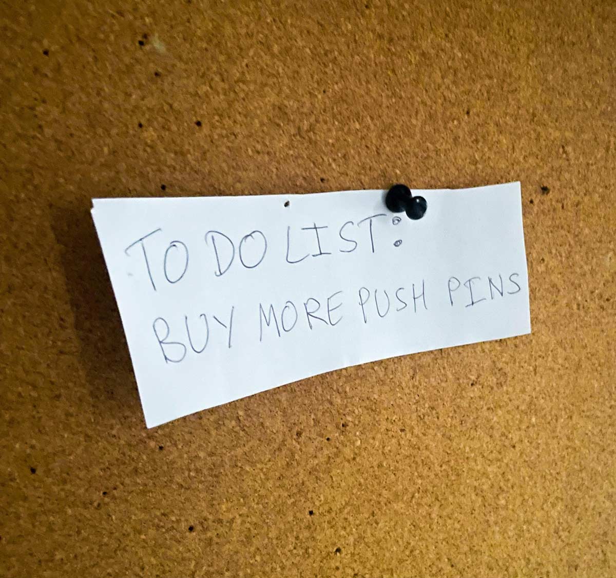 I just moved into a furnished apartment, the previous tenant only left me one push pin and a note on the cork board