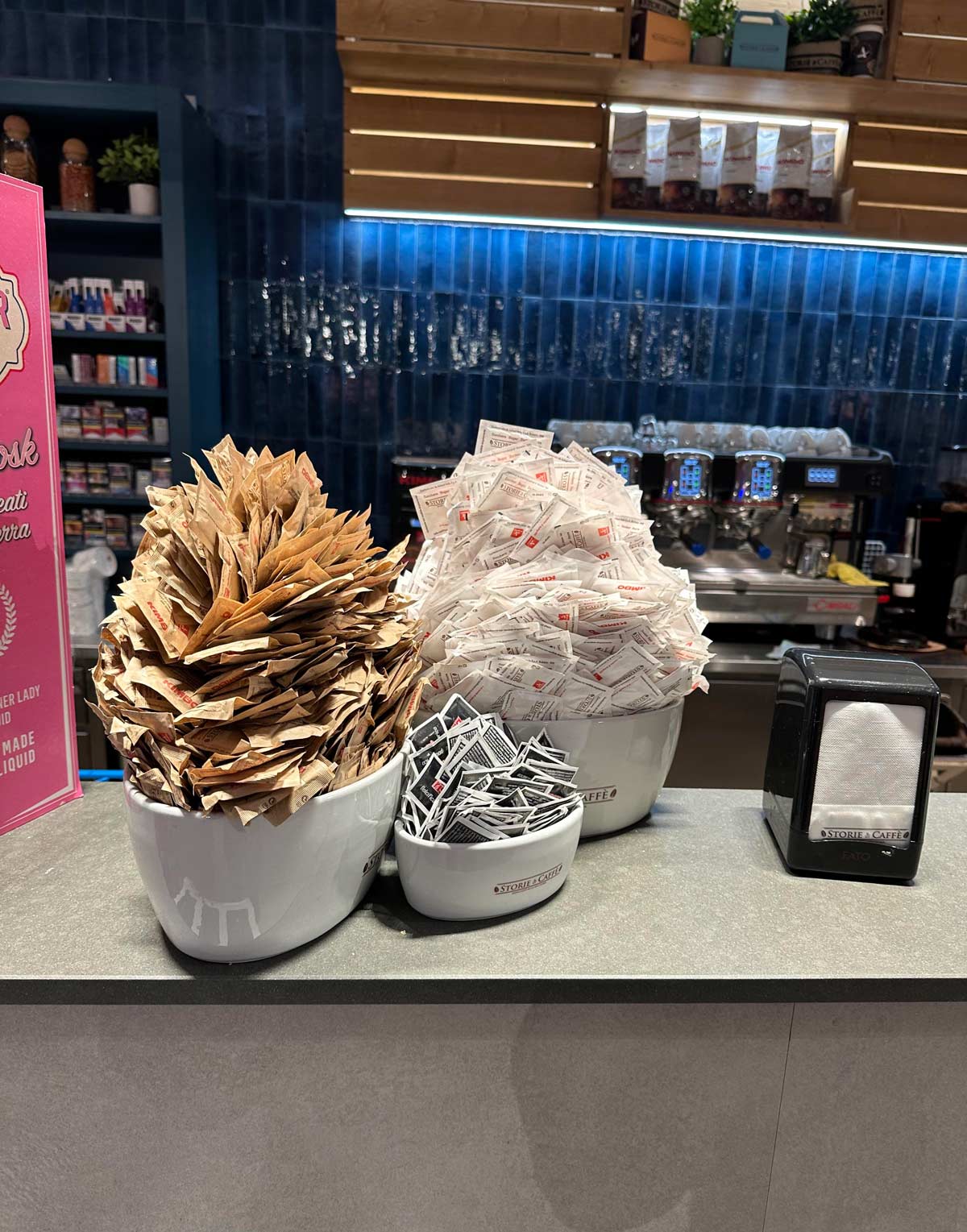 The sugar bowls at a Italian rest stop coffee bar